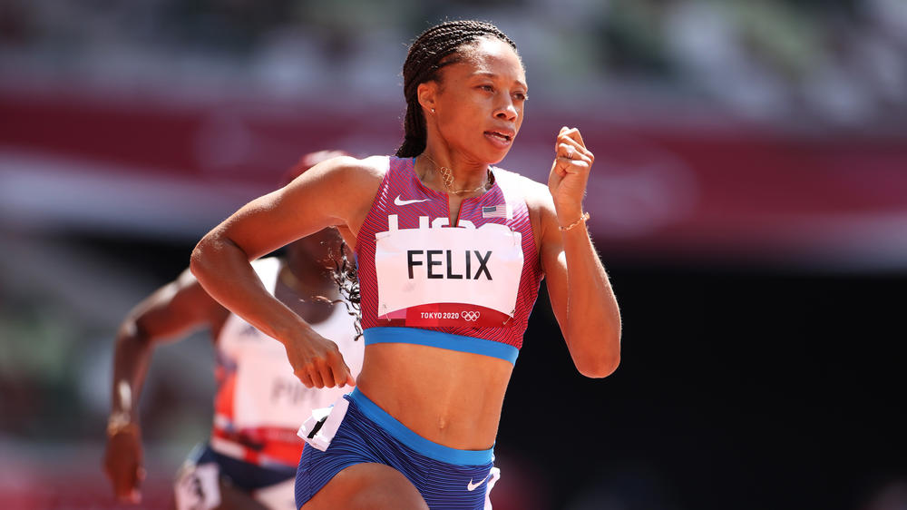 Allyson Felix of Team United States competes in round one of the women's 400m heats on Tuesday in Tokyo.