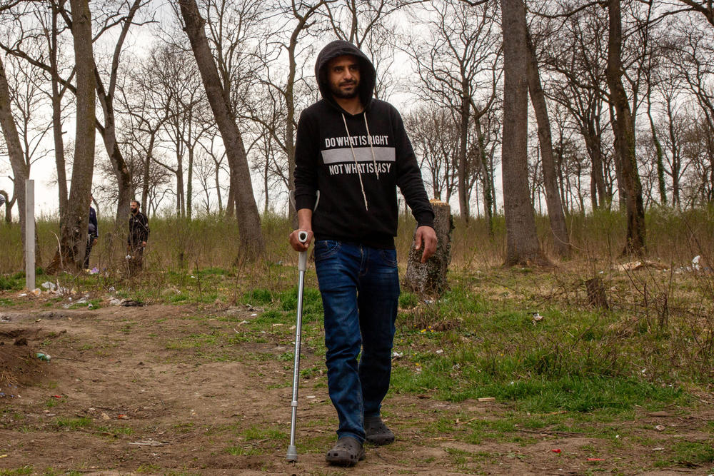 Ahmad al-Ghazali, from Syria, lives just outside the perimeter of Sombor camp in Serbia's north, near the borders with Croatia and Hungary. He was injured during a recent attempt to cross into the EU, he says, when he tried jumping the barrier that Hungary built along its boundary with Serbia and Croatia in 2015 to prevent asylum-seekers from accessing the country.