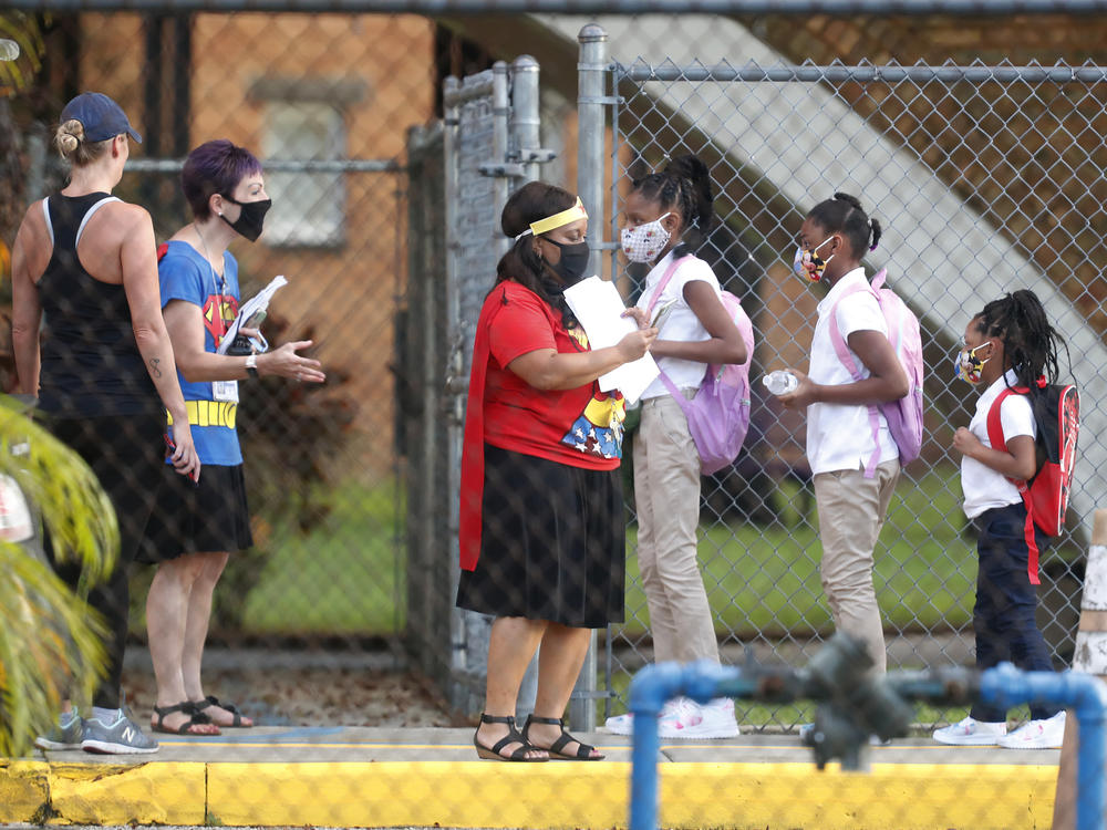 Students return to school at Seminole Heights Elementary in Tampa on Aug. 31, 2020, after the Florida Department of Education mandated in-class learning.