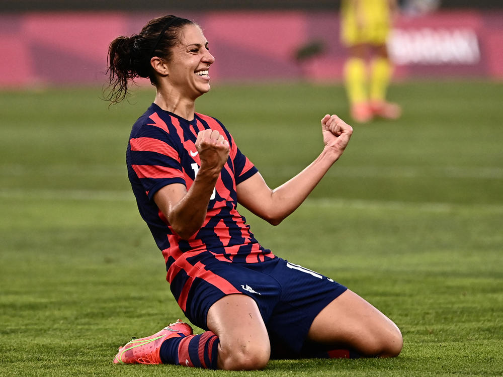 USA forward Carli Lloyd celebrates scoring during the  women's bronze medal match between Australia and the United States at Ibaraki Kashima Stadium on Thursday.