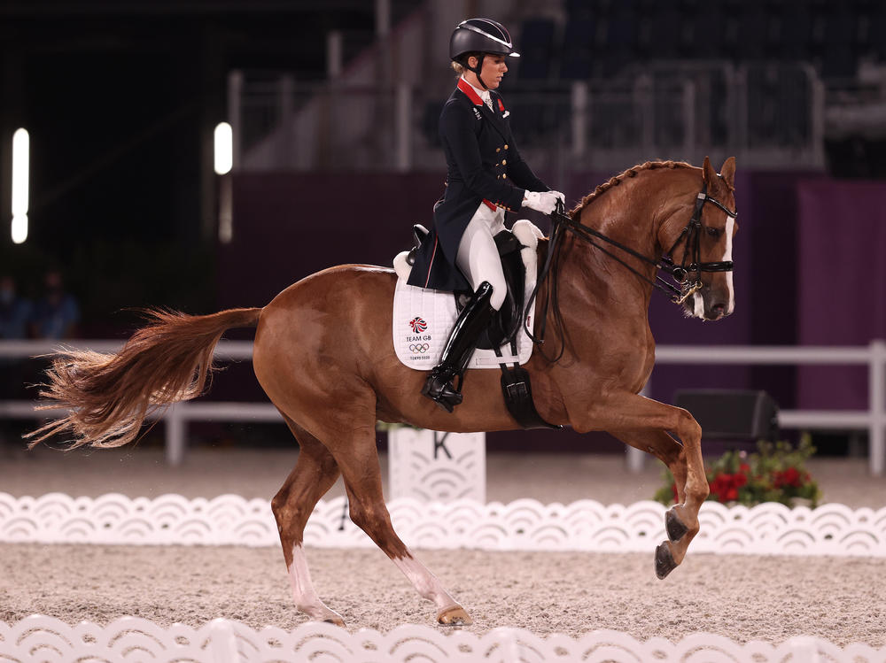 Great Britain's Charlotte Dujardin rides Gio while competing in the Dressage Individual Grand Prix Freestyle Final on July 28 at the Tokyo Olympic Games.