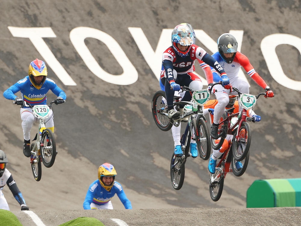 Connor Fields of Team USA leads other riders in the men's BMX semifinal on July 30 at the Tokyo Olympics. He would crash later, suffering a brain hemorrhage and broken rib.