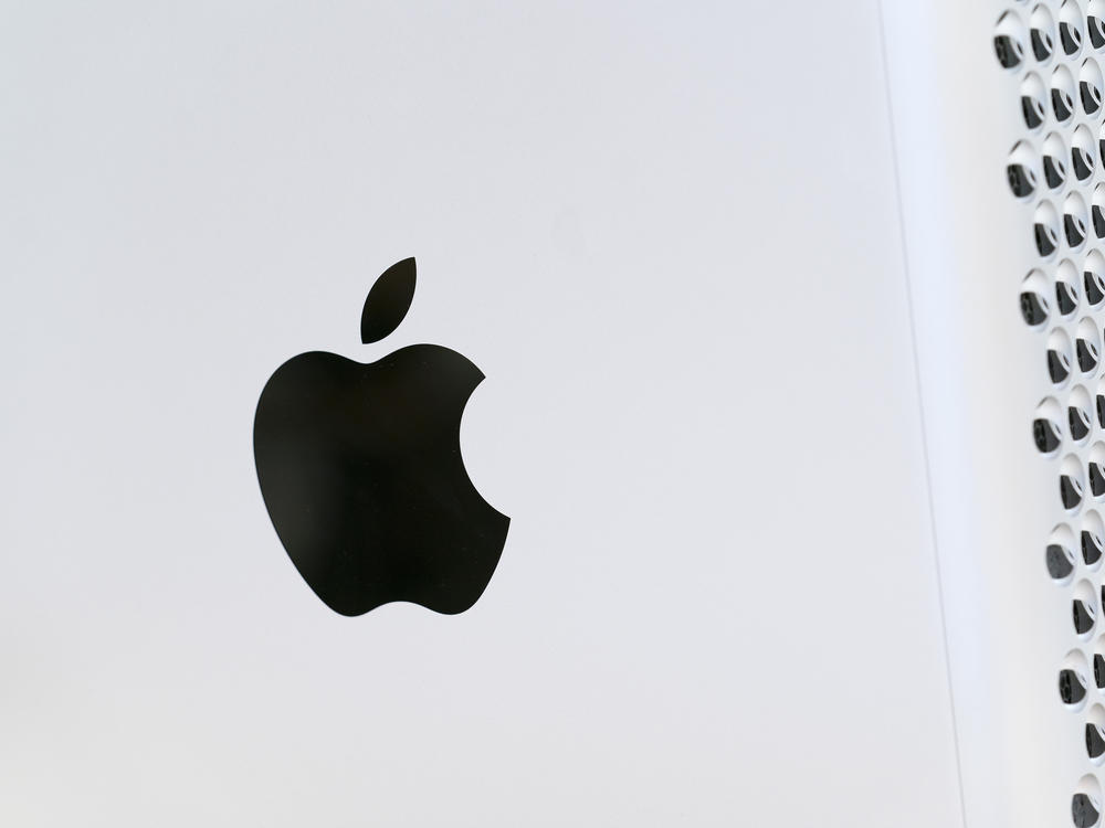 This May 21, 2021 photo shows the Apple logo displayed on a Mac Pro desktop computer in New York. Apple is planning to scan U.S. iPhones for images of child abuse, drawing applause from child protection groups but raising concern among security researchers that the system could be misused by governments looking to surveil their citizens.