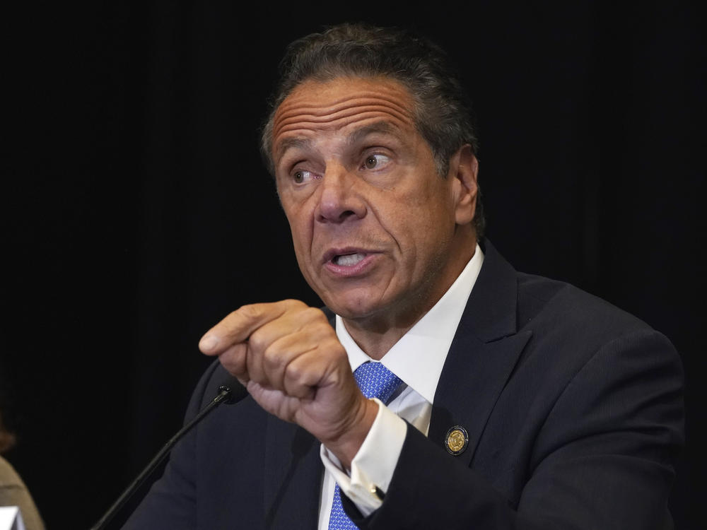 New York Gov. Andrew Cuomo, here in July, has faced calls to resign following the release of the state attorney general's report that alleges he sexually harassed 11 women.
