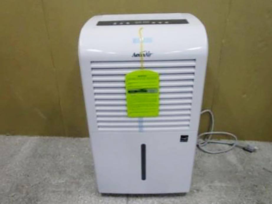 This photo provided by Consumer Product Safety Commission shows a dehumidifier made by New Widetech. The Consumer Product Safety Commission says, Friday, Aug. 6, 2021, about 2 million dehumidifiers made by New Widetech are being recalled in the U.S. because they can overheat and catch fire, posing fire and burn hazards.