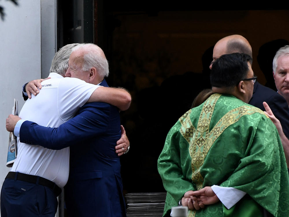 President Biden hugs Jason Casper, a fellow parishioner at St. Joseph on the Brandywine Catholic church in Wilmington during a recent trip home.
