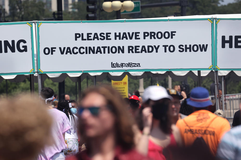 Guests are asked to show proof of vaccination as they arrive for the first day of Lollapalooza last week in Chicago.