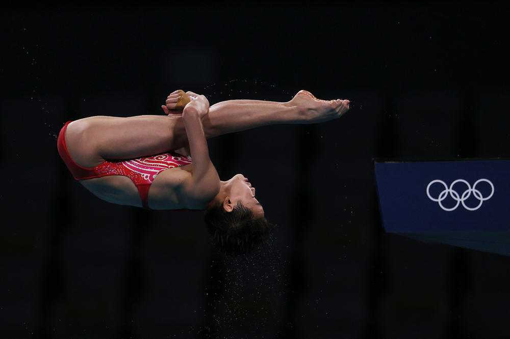 Quan Hongchan of Team China competes in the women's 10 meter platform final.