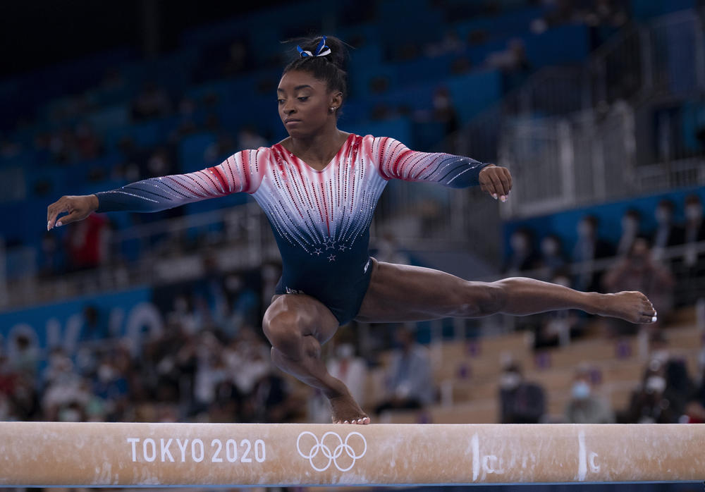 Simone Biles competes in the balance beam final on August 3.