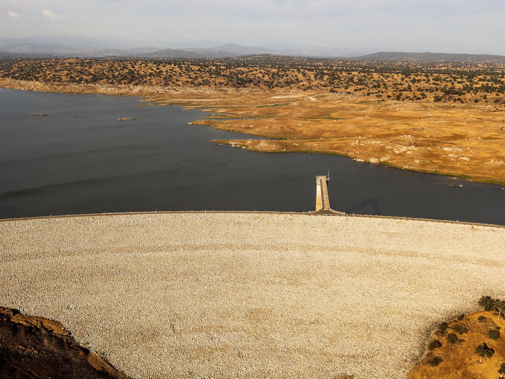Eastman Lake in Madera County, Calif., was holding just one-fifth of its usual water volume in June. An extreme drought is unfolding this summer in the Western U.S., exacerbated by climate change.
