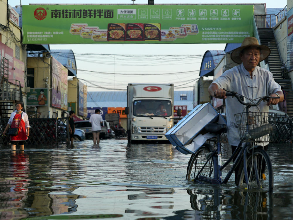 Heavy rain caused severe flooding in July in China's Henan province. Scientists say human-caused greenhouse gas emissions are causing more extreme precipitation in many parts of the world.