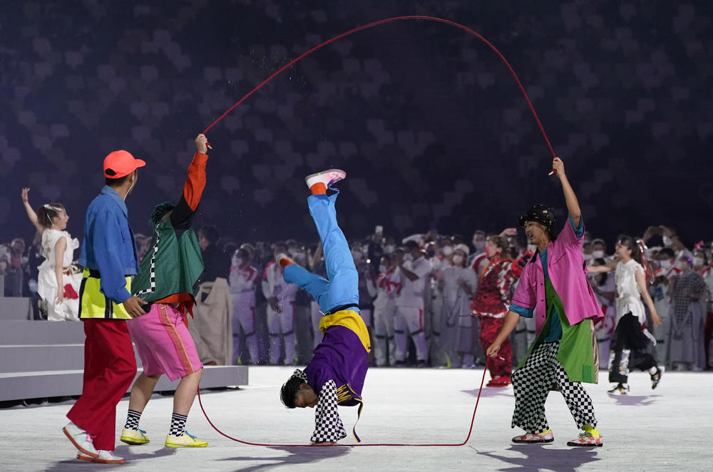Dancers perform during the closing ceremony in the Olympic Stadium.