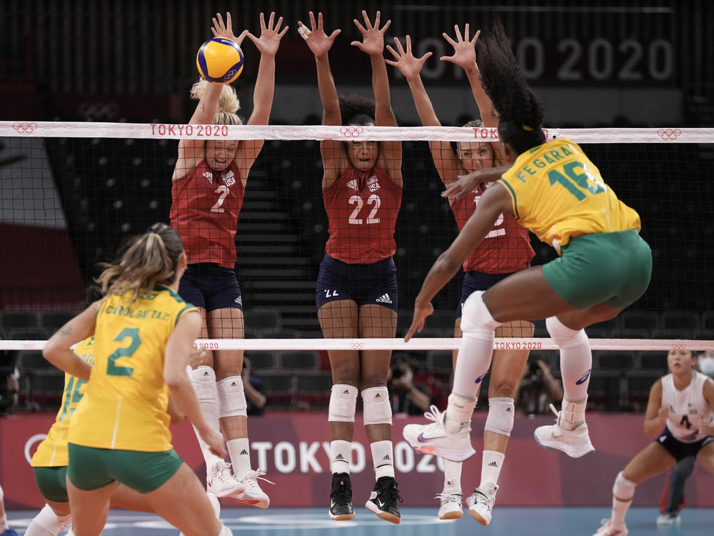 Brazil's Fernanda Rodrigues shoots while playing the United States during the gold medal match in women's volleyball at the 2020 Summer Olympics on Sunday.