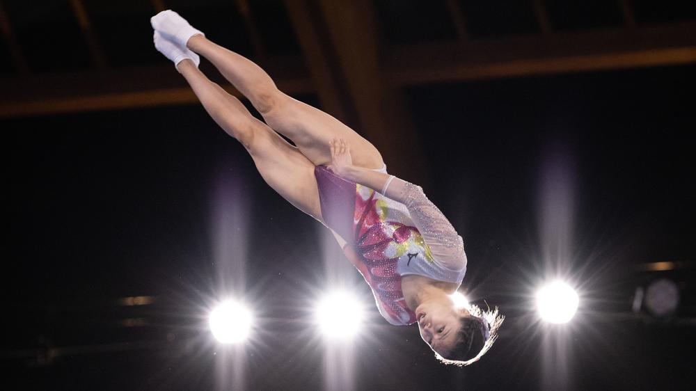 Japan's Megu Uyama competes in the women's final of the Trampoline Gymnastics event. It would take a very tall photo to show you where the trampoline is.