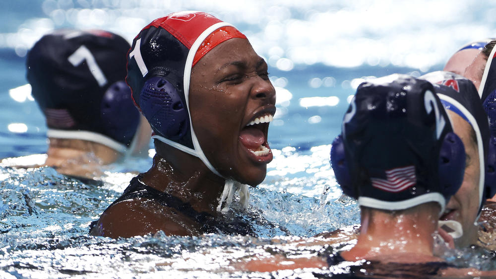 Team USA goalkeeper Ashleigh Johnson celebrates a gold medal in water polo. You should probably be watching more water polo.