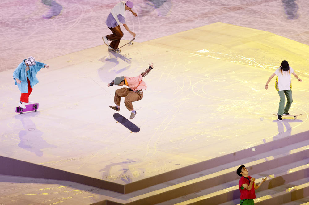 Skateboarders perform during the Closing Ceremony of the Tokyo 2020 Olympic Games.