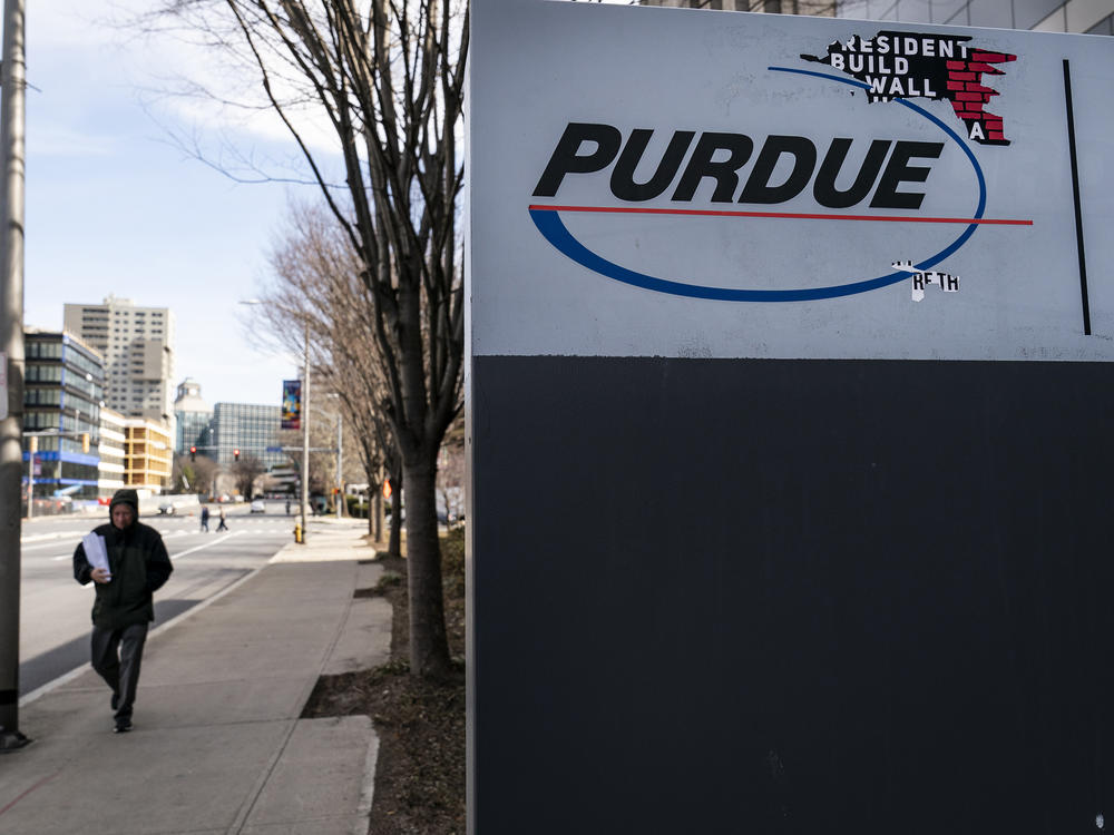 Signage for Purdue Pharma headquarters stands in downtown Stamford, April 2, 2019 in Stamford, Connecticut. Purdue Pharma, the maker of OxyContin, and its owners, the Sackler family, are facing hundreds of lawsuits across the country for the company's alleged role in the opioid epidemic that has killed more than 200,000 Americans over the past 20 years.