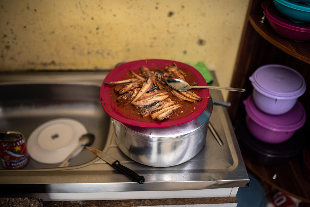 A plate of sardines in the kitchen. Maphini and her family have been relying on cheap proteins to supplement their meals.