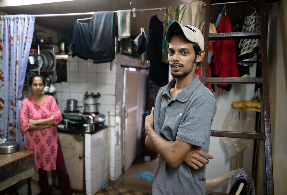 Salman Khan Rashid, 24, right, and his mother, Sana Rashid, at home. Salman lost his job as a golf coach at a Mumbai sports club during the pandemic. The household, which includes Salman's three sisters, is now surviving on savings.