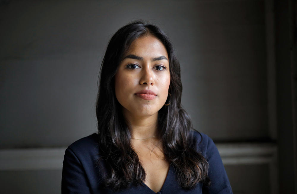 Tashrima Hossain, who used to work on Wall Street, but quit to join Facebook, is part of a growing number of young people who are no longer attracted to investment banking despite surging salaries. She posed for a portrait at Alamo Square in San Francisco on Aug. 11.