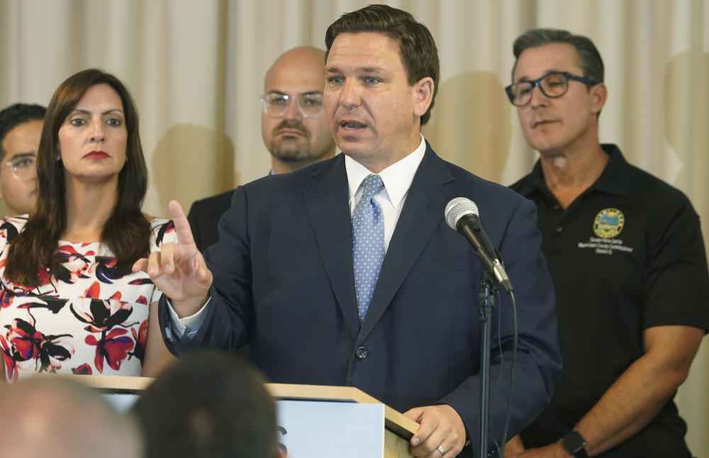 Florida Gov. Ron DeSantis, here at a news conference Tuesday, has announced plans for a state-run mobile unit providing monoclonal antibody treatments.