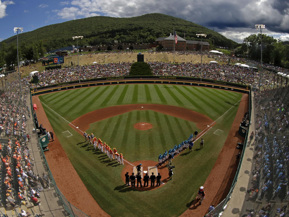 One year after the Little League World Series was canceled due to the COVID-19 pandemic, the upcoming series will be played without spectators from the general public. Here, players are seen on the field at Lamade Stadium in South Williamsport, Pa., during the tournament's 2019 edition.
