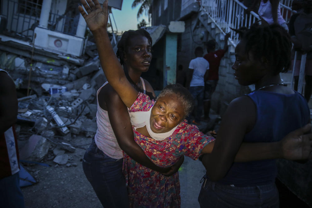 <strong>Sat., Aug. 14</strong>: Oxiliene Morency cries out in grief after the body of her 7-year-old-daughter Esther Daniel was recovered from the rubble of their home destroyed by the earthquake in Les Cayes, Haiti.