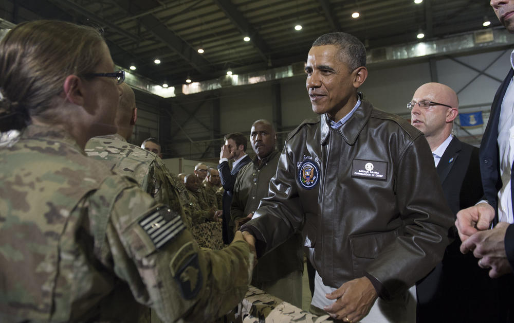 President Barack Obama greets U.S. troops during a surprise visit to Bagram Airfield, north of Kabul, in May 2014.