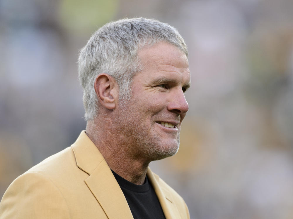 Former NFL quarterback Brett Favre looks on as he is inducted into the Ring of Honor during a halftime ceremony during the game between the Green Bay Packers and the Dallas Cowboys on Oct. 16, 2016.