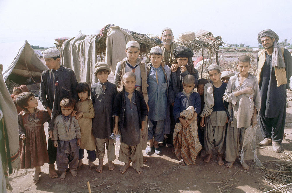 Afghan refugees are shown in a camp on Kohat Road outside of Peshawar, Pakistan, in 1980.