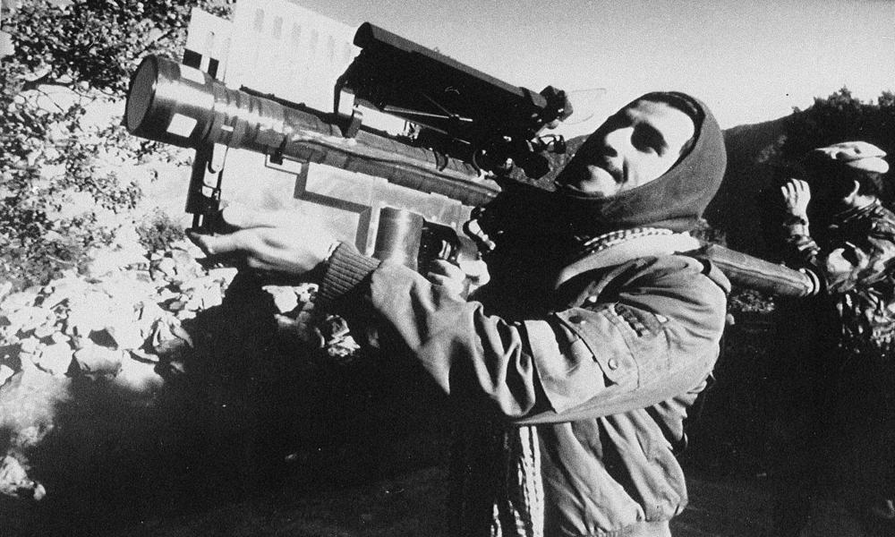 An Afghan guerrilla handles a U.S.-made Stinger anti-aircraft missile.
