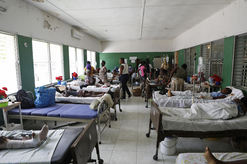 At the Immaculée Conception Hospital in Les Cayes, Haiti, people are treated for injuries suffered during the 7.2 magnitude earthquake that struck the city on Aug. 14.
