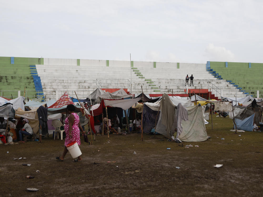 Hundreds of people are living in a makeshift tent city inside the main soccer stadium in Les Cayes, Haiti, following the  7.2 magnitude earthquake.