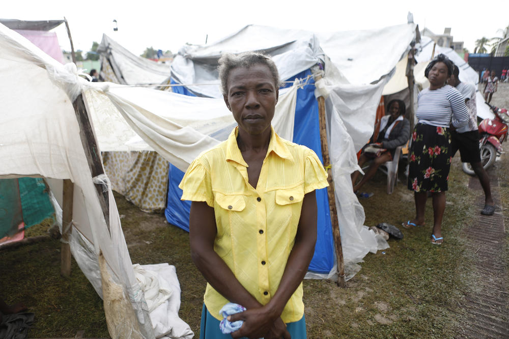 Desimene Lormera is currently living in a makeshift tent at the stadium. Aid groups have handed out some relief supplies at the stadium but some of the displaced people say they haven't received any.