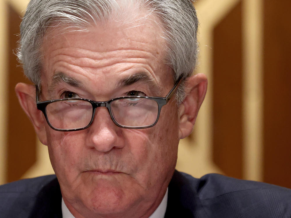 Federal Reserve Chair Jerome Powell appears before the Senate Banking, Housing and Urban Affairs Committee in July. The Fed is facing a key decision of when to start withdrawing some of the stimulus it has provided to markets during the pandemic.