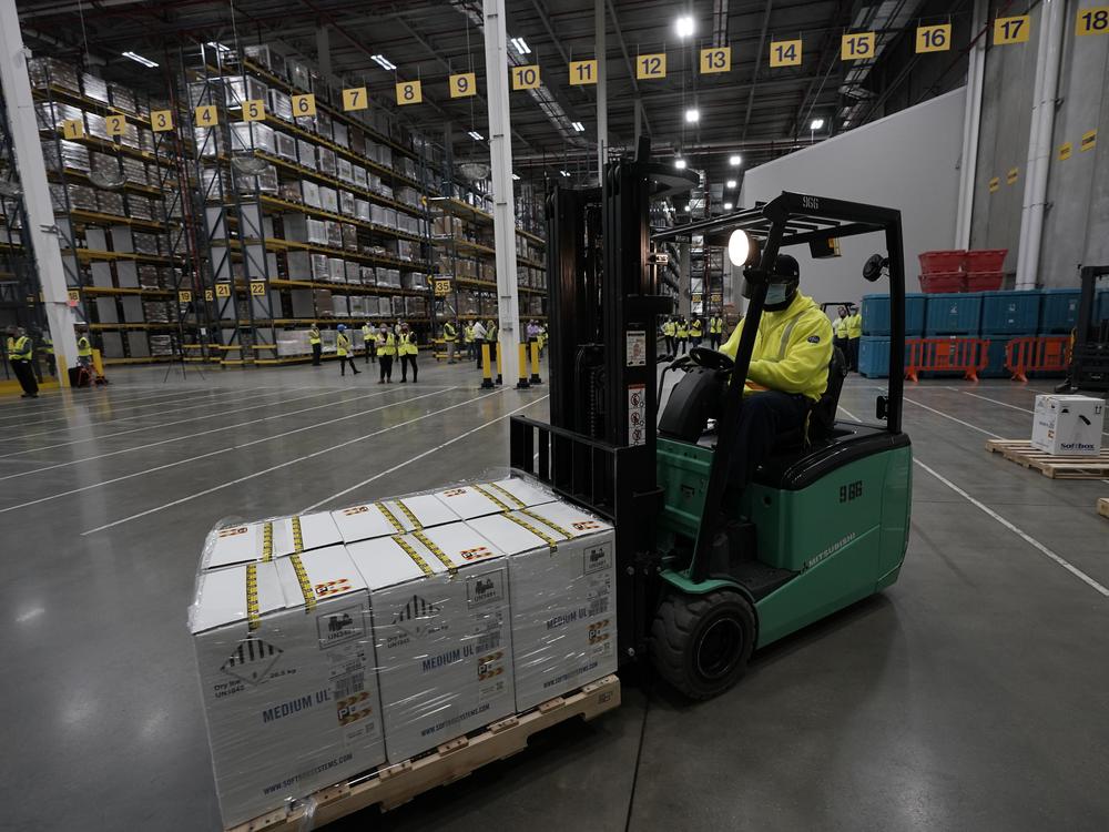Boxes containing Pfizer's COVID-19 vaccine were prepared for shipment at the company's Kalamazoo, Mich., plant in December.
