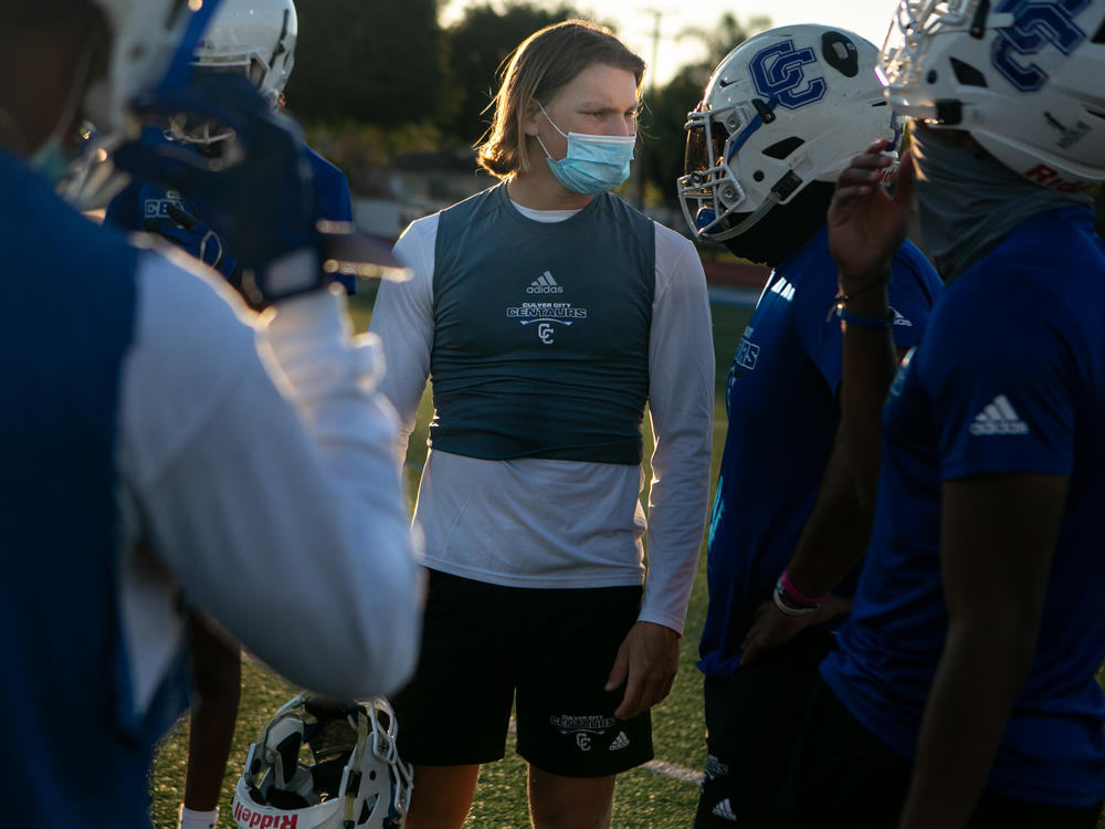 Culver City High School quarterback Zevi Eckhaus participates in the first official football practice in February after an 11-month shutdown due to COVID-19. The Culver City Unified School District is developing a plan for those who do not comply with a vaccination mandate for students.