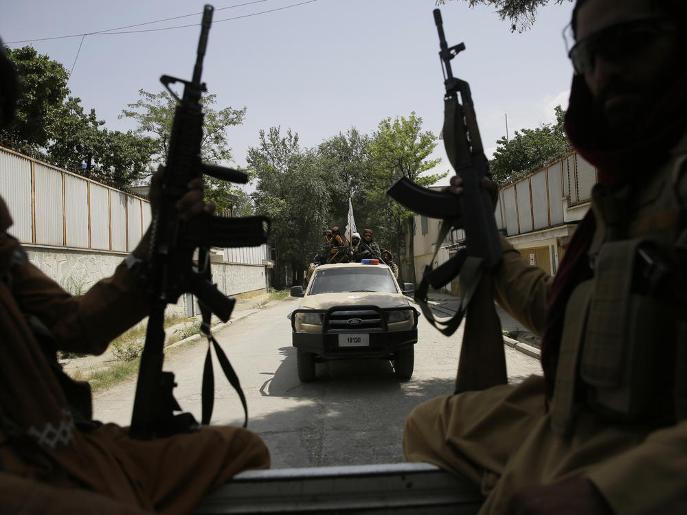 Taliban fighters patrol in Kabul, Afghanistan in August. After the Taliban takeover, employees of the collapsed government, civil society activists and women are among the at-risk Afghans who have gone into hiding or are staying off the streets.