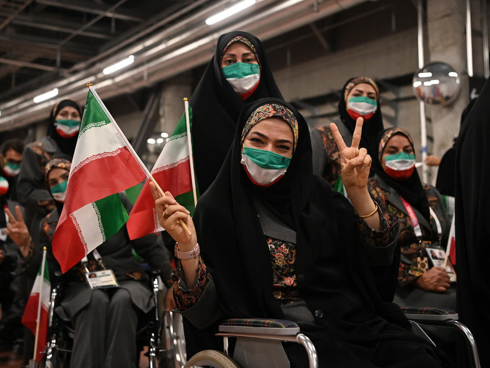 Members of Team Iran pose during the opening ceremony of the Tokyo 2020 Paralympic Games.