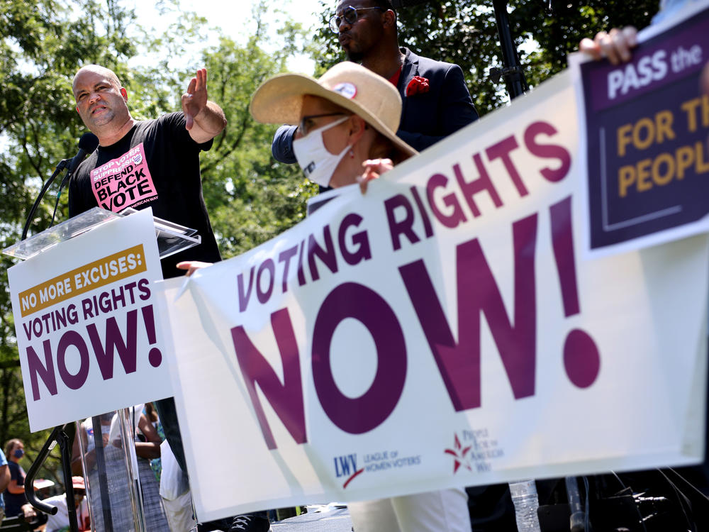 Civil rights leader Ben Jealous speaks at a voting rights rally outside the White House on Tuesday, ahead of a House vote to advance a bill named for the late Rep. John Lewis.