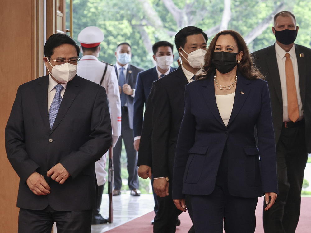 U.S. Vice President Kamala Harris meets Vietnam's Prime Minister Pham Minh Chinh at the Office of Government in Hanoi, Vietnam, Wednesday, Aug. 25, 2021.