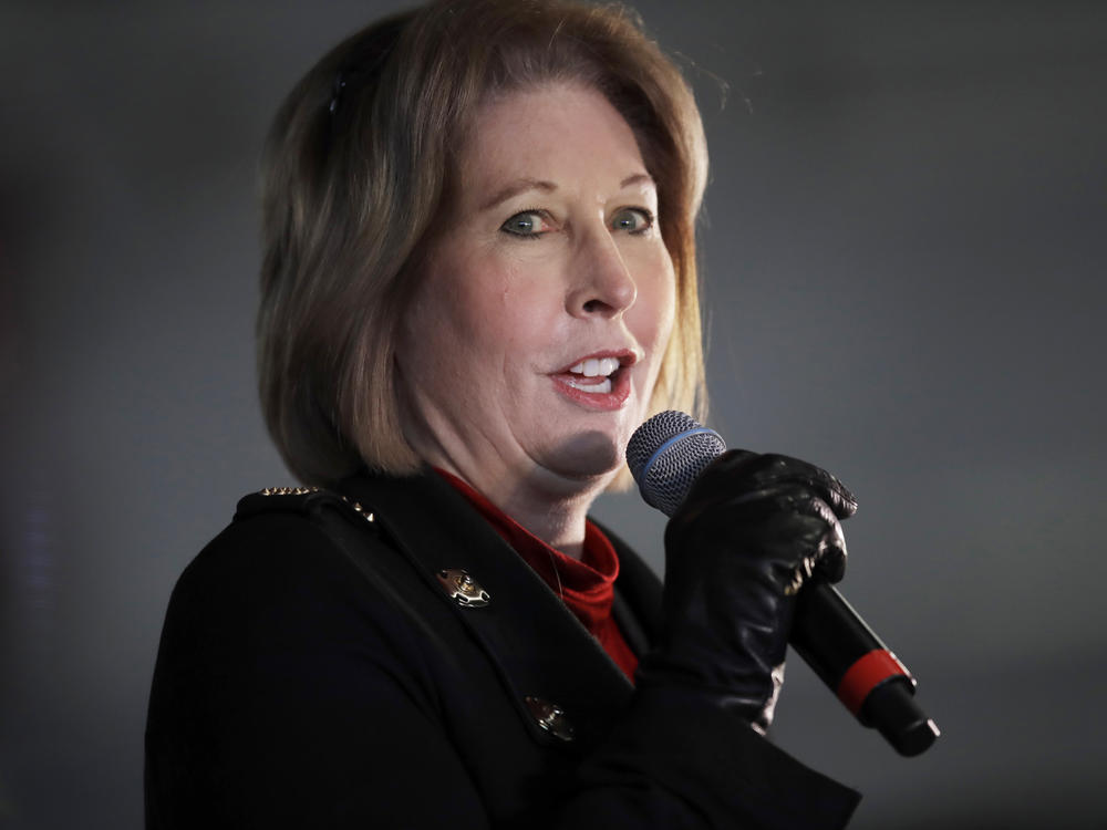 Nine lawyers, including Sidney Powell, pictured in December, allied with former President Donald Trump face financial penalties and other sanctions after a judge said they had abused the court system to undermine the 2020 election.
