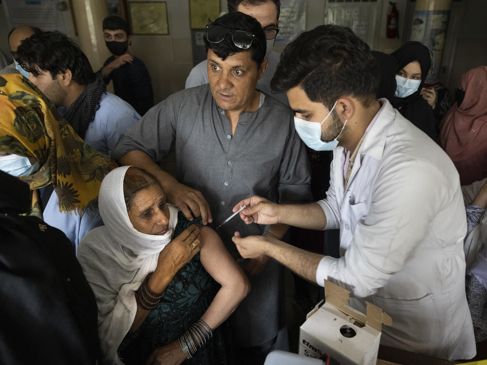Doctors administer the Johnson & Johnson COVID-19 vaccine to patients at the Wazir Akbar Khan hospital in Kabul, Afghanistan in July.
