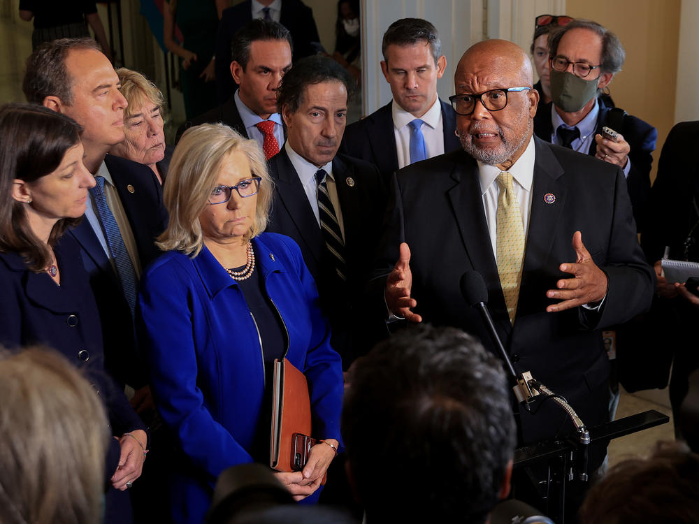 Reps. Bennie Thompson (right) and Liz Cheney, joined by fellow committee members, speak to the media after a July 27 hearing of the House select committee investigating the Jan. 6 attack on the U.S. Capitol.