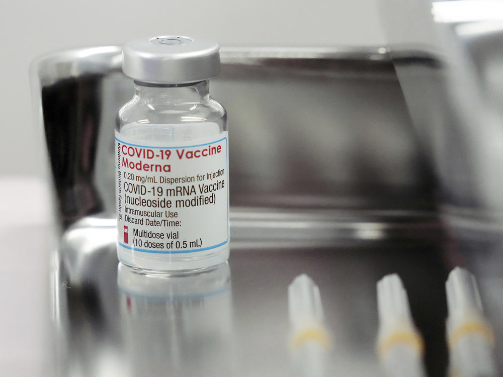 This June 14, 2021, file photo shows a Moderna COVID-19 vaccine vial that is being administered for flight attendants of Japan Airlines at Haneda Airport in Tokyo.