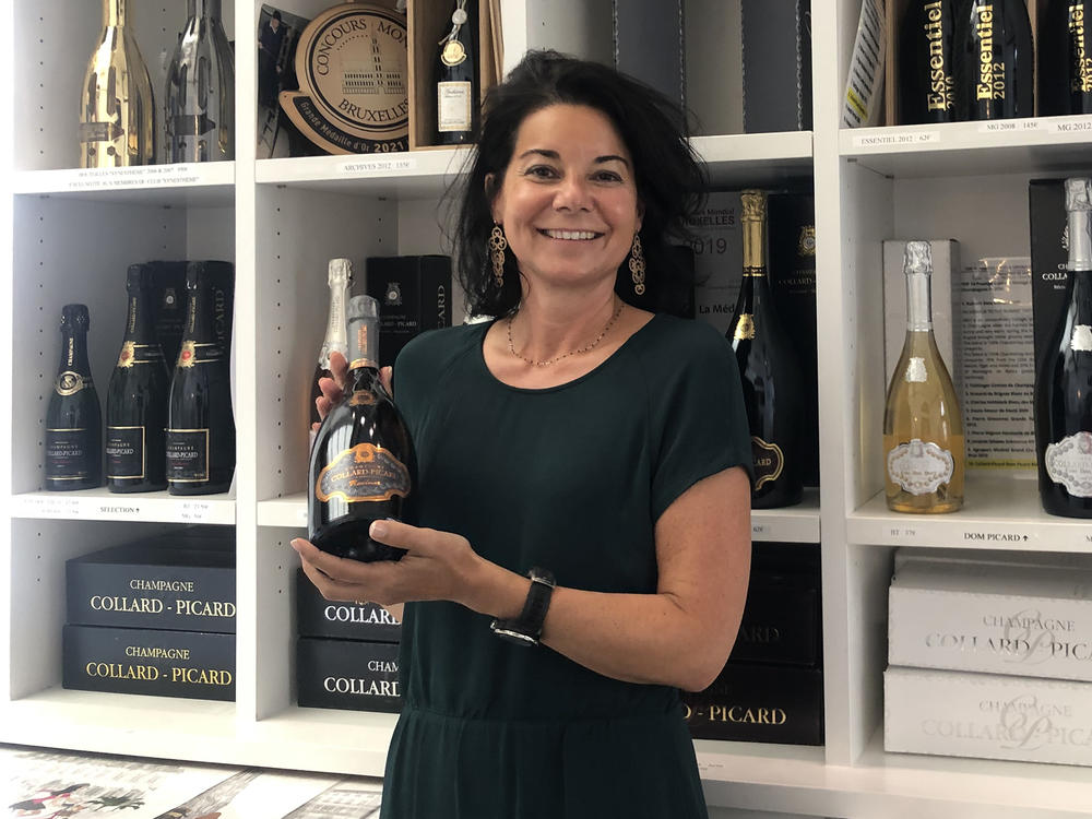 Marie Collard of the champagne house Collard-Picard in her retail shop in Epernay, France. Collard has not yet decided whether to remove the word 