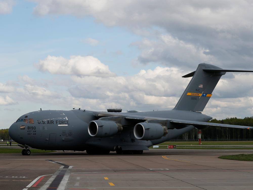 A U.S. Air Force C-17 Globemaster transport plane carrying medical supplies lands in Moscow in May 2020. The same type of plane airlifted refugees from Afghanistan this past week — one of whom gave birth on the aircraft.