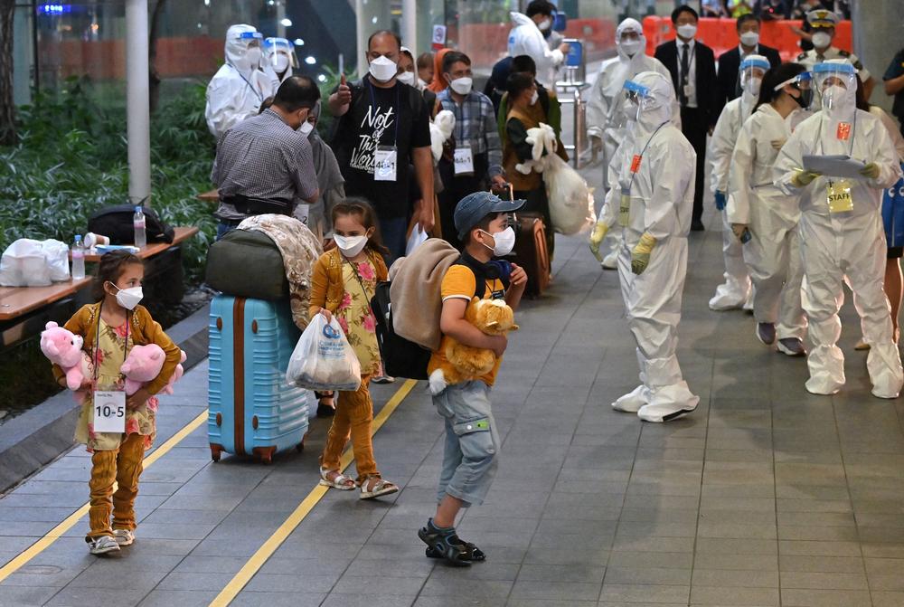 <strong>Thurs., Aug. 26: </strong>Afghan evacuees arrive at Incheon International Airport outside Seoul, South Korea.