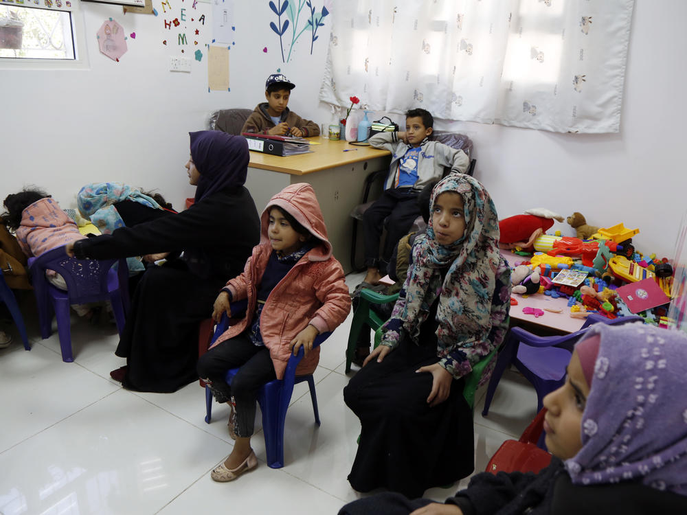 Yemeni children diagnosed with cancer wait to receive treatment at an oncology ward of a hospital in Sana'a on February 4. A new study looks at the impact of COVID-19 on kids with cancer.