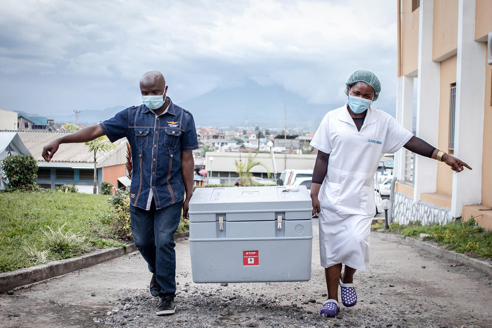 Health workers carry supplies as a part of the COVAX vaccination campaign in May in Goma, Democratic Republic of the Congo. In recent years, Congo has also faced a large measles epidemic and outbreaks of Ebola.